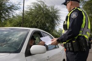 A police officer conducting a DUI checkpoint stop in Phoenix